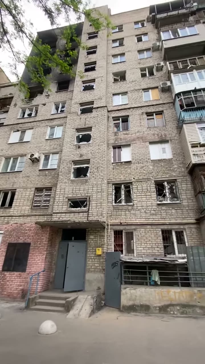 104 — full facade, multiple floors fire-scorched, May 2022