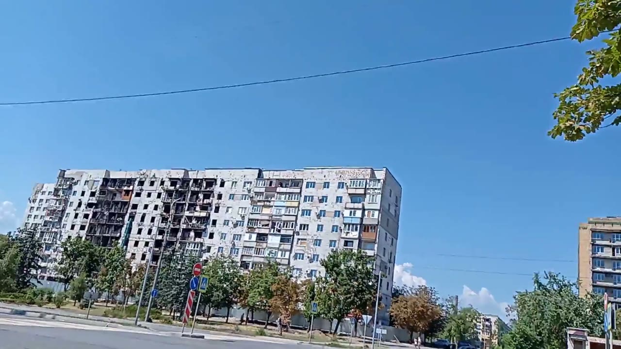 Walkthrough of the fenced but idle 104-110 stretch, rusty perimeter fencing, idle hoist
